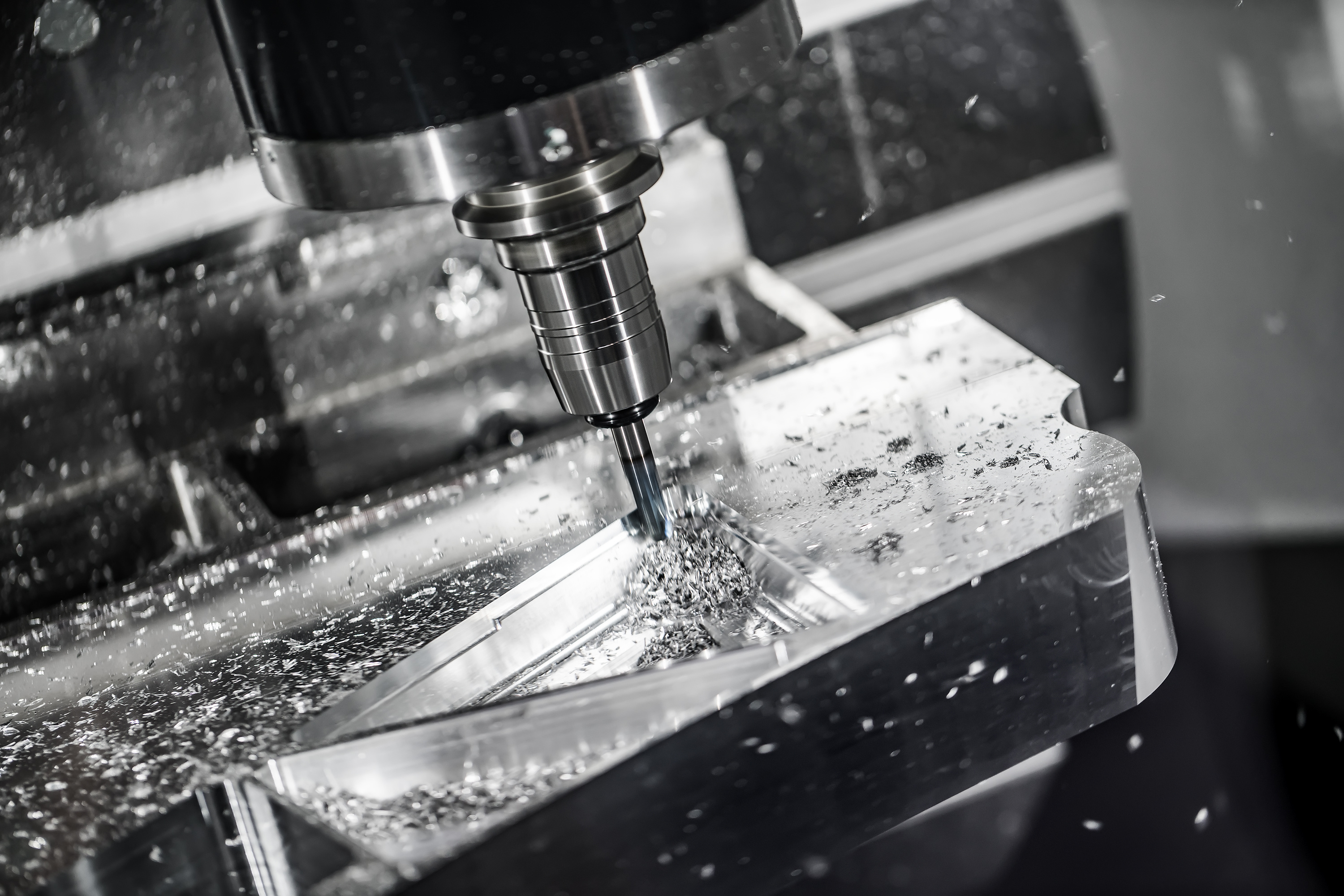 Industrial cutting tools, measurement tools, and machined metal parts